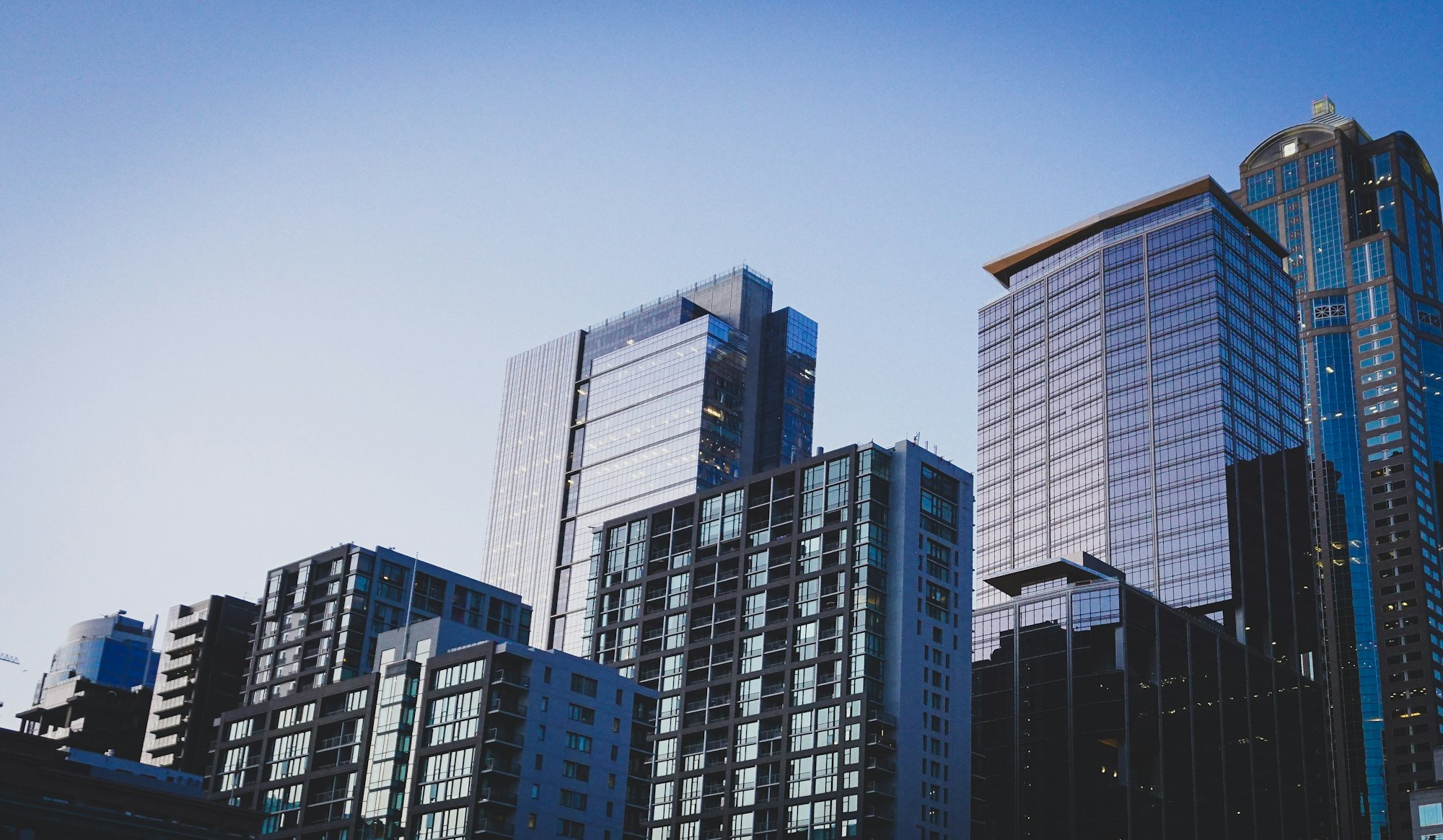 Residential apartments beside commercial towers in a mixed-use district